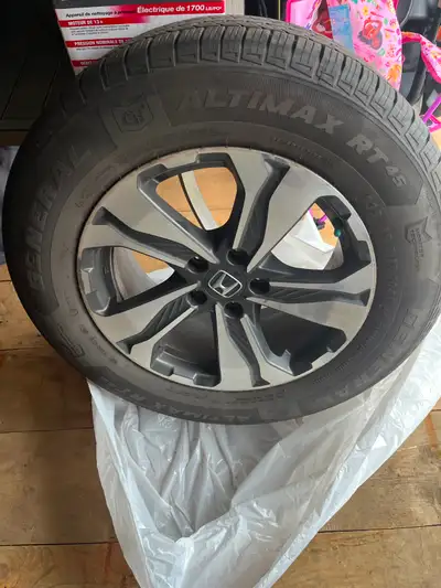 Selling a set of four 17” Honda alloy rims with all season tires. Tires are 235/65R17 General Altima...