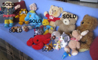 A Bunch of Stuffed Toys, Big and Tiny