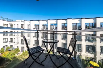 Closed Bedroom, Balcony, Interior Courtyard View Aug or Sept