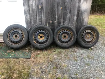 I am selling a set of 4 Blacklion Ice Pioneer W506 winter tires mounted on 16-inch black steel rims....