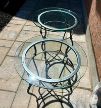 Two tempered glass coffee /side tables, measure 24 inches high, 