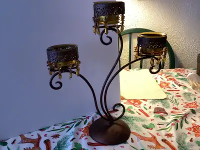candle holder looks. brass holds3 candles, View more