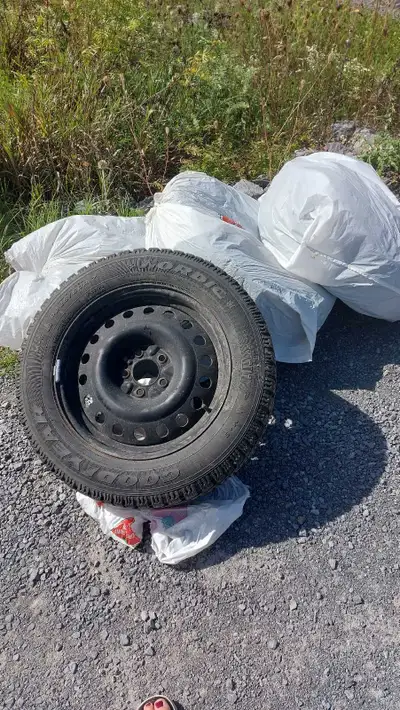 225/60R17 snow tires. Used for two seasons only. Lots of life left to it. Comes with rims.