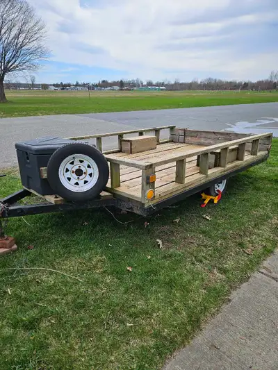 Built on pop-up trailer frame Pressure treated lumber 6ft 7in outside width 10ft-long box not includ...