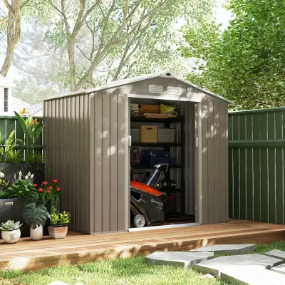 This outdoor storage shed provides ample space for tools, garden equipment, and furniture. Made from...