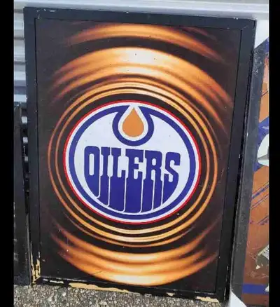 Add some team spirit to your space with this Edmonton Oilers sign! This is a used sign, so it has so...