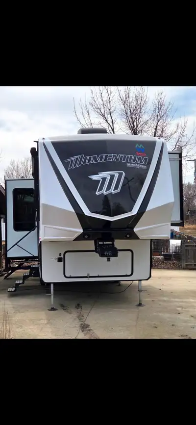 11'3" garage, solar panels, sound system, lighting system, extra power cords and sewer connectors, v...