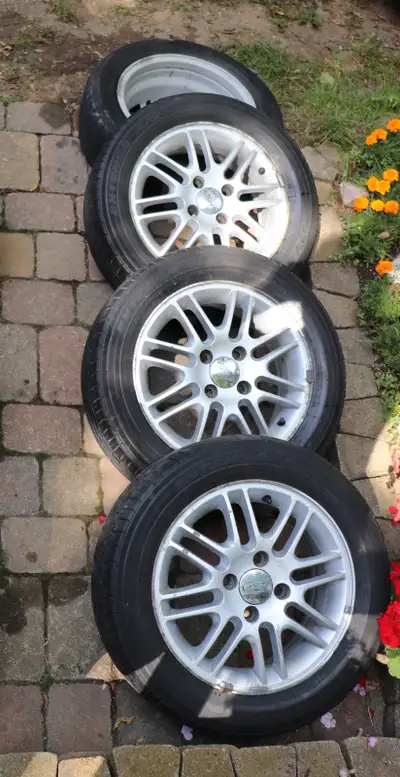 These aluminum rims have some scuffs but are still quite presentable, also the tires need disposal $...