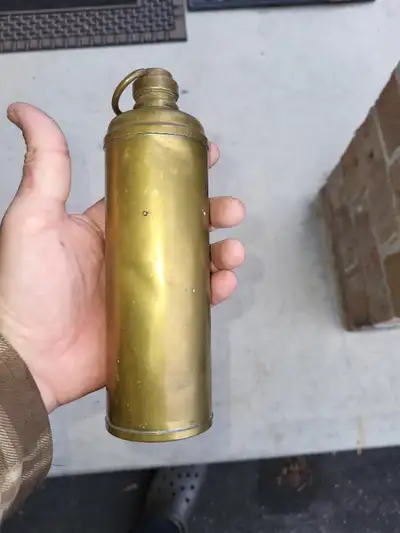 Vintage brass bottle with lid