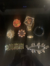 Lot of older jewelry 5 broaches and 3 bracelets 
