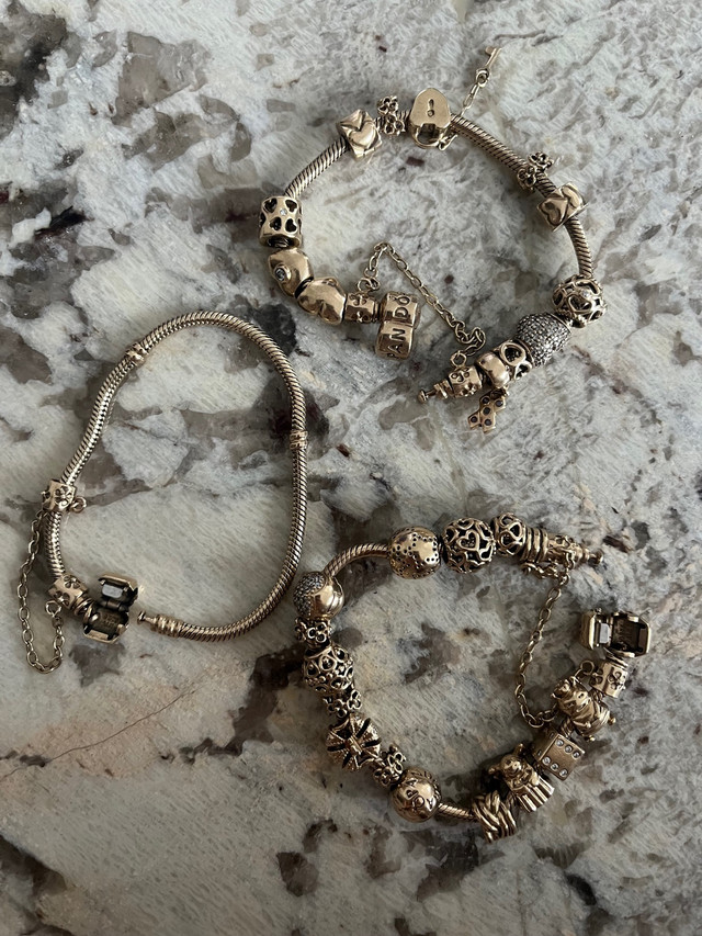 Pandora 14k gold bracelet with charms  dans Bijoux et montres  à Laval/Rive Nord