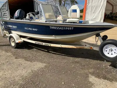 2000 Smoker Craft 16.2 pro mag Aluminum 70 horse Evinrude outboard motor Down rigger comes with, whi...