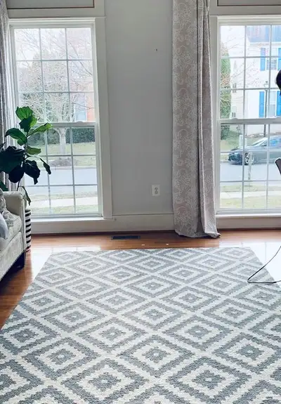 Brand new / never used wool rug. Been in storage and only unwrapped to take photos. Grey and white g...