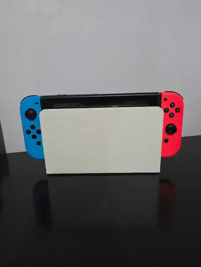Nintendo Switch + 128GB Micro SD Card, View more