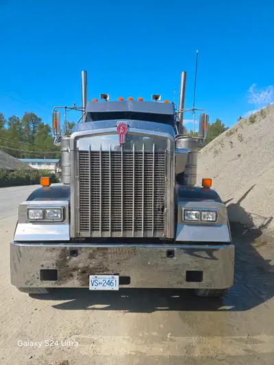 Description Kenworth W900L 1999 dump truck with nahani box high lift talegate. Cat 3406E motor 18spd...