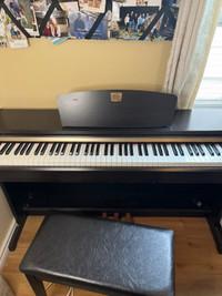 Yamaha Clavinova (CLP-115) upright digital piano