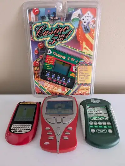 Hand Held Electronic Games: Deal or No Deal, Blackjack, Deuces.., View more