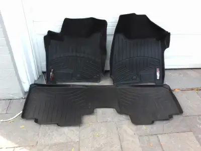 WEATHERTECH floor mats (front and rear) from Cadillac SRX model. Used only 3 years by elderly couple...