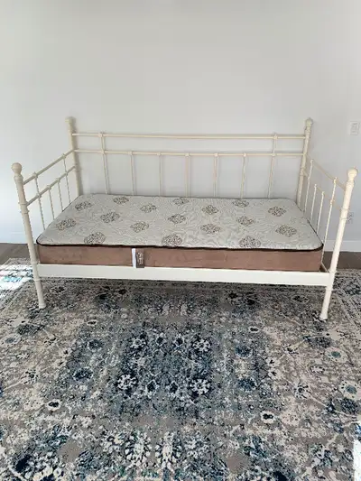 Metal frame with slats and mattress,good condition ,clean,no stains,delivery available