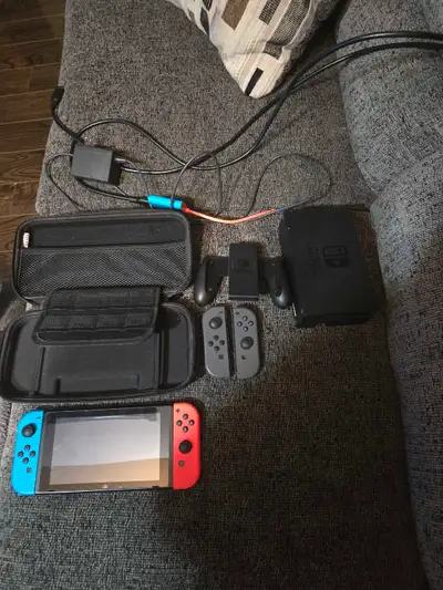 Selling used Nintendo Switch V1 + Accessories + 128GB MicroSD, View more