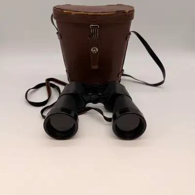 Vintage Carl Wetzlar 16x50 Rangefinder binoculars with original leather carrying case. These classic...
