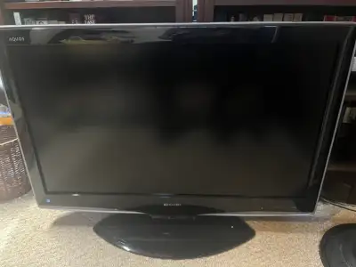 Used Sharp Aquos TV, which features a crisp display and reliable performance. It is great for watchi...