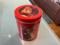 Round collectable Christmas gift tin