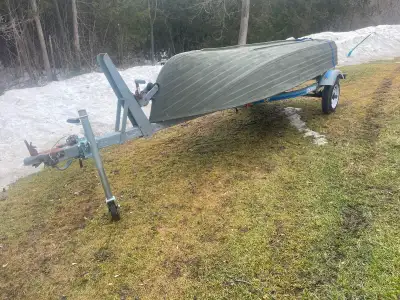 Galvanized boat trailer will handle up to 16’ boat New bearings, wheels & tires Has bearing buddies...