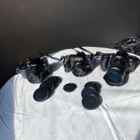 Minolta 35 SLR film cameras + lenses - Prices in the Description