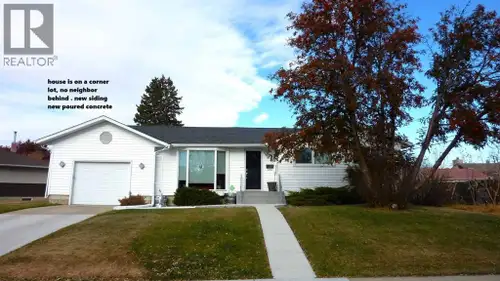 Over $100,000 in upgrades including: siding, roof, windows, hardwood floors, vinyl fence, custom kit...