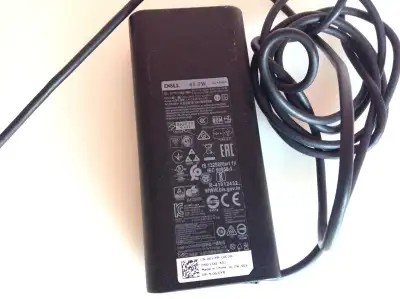 The Dell LA65NM190 AC Adapter, a 65W power adapter, View more