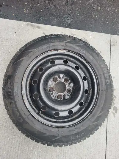 This used Ovation W586 winter tire, size 215/60R16 99H XL, comes mounted on a sturdy steel rim and i...