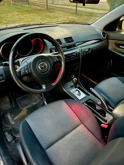Selling 2005 Mazda 3 sedan with 240,000km. Car runs and drives, Automatic Transmission, AC/heater wo...