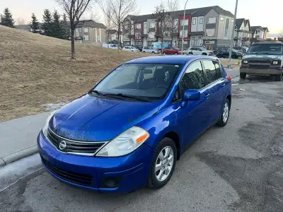 For Sale: 2009 Nissan Versa SL 1.8L – Low Mileage (167,000km) Rebuilt Status Well-maintained and fue...