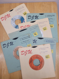 Seven vintage 45 rpm vinyl