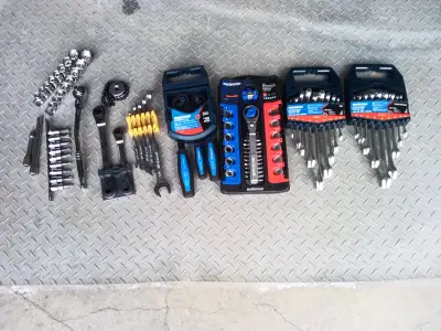 Many never used picture 1 sockets and ratchets $140 , picture 2 automotive tools $ 60- washboard par...