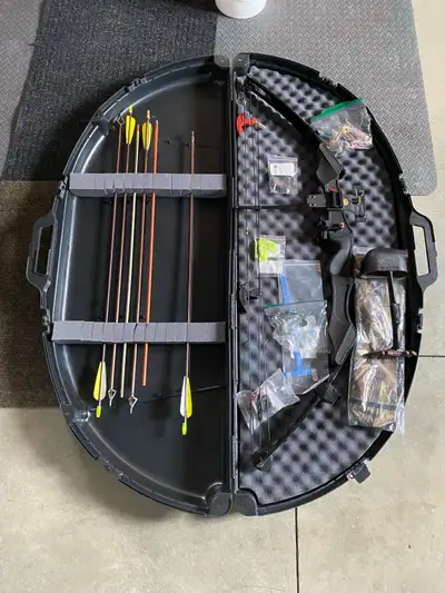 Golden eagle compound bow 60lb pull Misc parts and pieces broad heads, arrows, quiver, release and m...