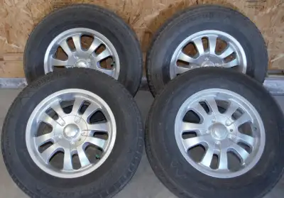17" Rims with 245/70R17 Motomaster Winter Edge Winter Tires. Three tires have about 6/32" tread and...
