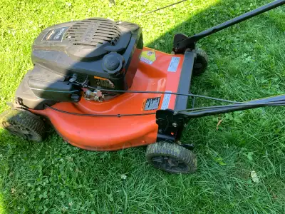Ariens lawnmower and Homelite trimmer