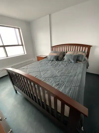 Bedroom set includes: Queen bed frame (headboard/footboard/frame), dresser, mirror and nightstand. $...