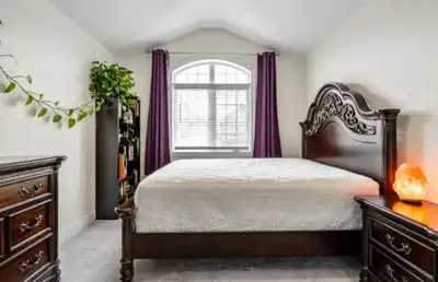 Beautiful queen size bedroom set. Like new. Set includes: dresser with mirror and bed frame with 2 n...