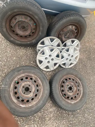 Off civics SE * Great tires could be used for another 50,000 - 100,000 Km Added civic wheel Covers.