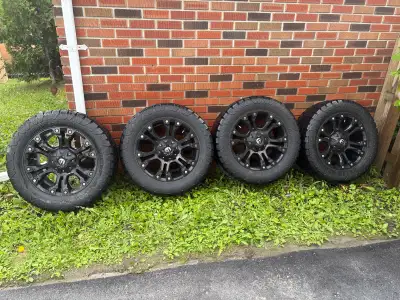 20 inch 6 bolt fuel rims with 305/55R20 amp terrain pro tires tread still good for a few more summer...