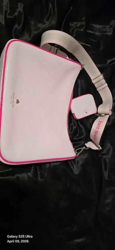 Almost new. Perfect condition coming with small wallet and 2 straps.