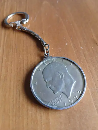 Vintage coin with keychain is a true American dollar. Pickup in south Pickering. No shipping.