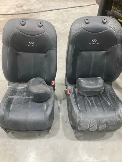 These black leather Infiniti full power front seats are in fair, pre-owned condition and come comple...