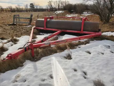 Park Lake Welding 1642 land roller. 16 feet wide with 42 inch drum. Built in transport and can fill...