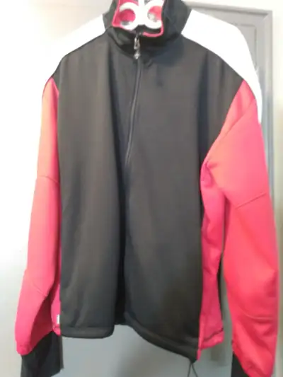 Large curling Jacket with custom sleeves. Only worn a few times.
