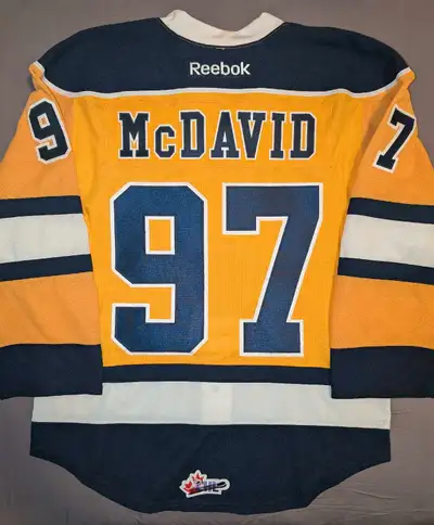 This is a Reebok Erie Otters CHL official jersey, size 52, featuring Connor McDavid's name and numbe...
