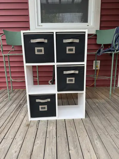 Shelving unit 24” wide by 36” tall and 11 1/2” deep. Comes with 4 boxes